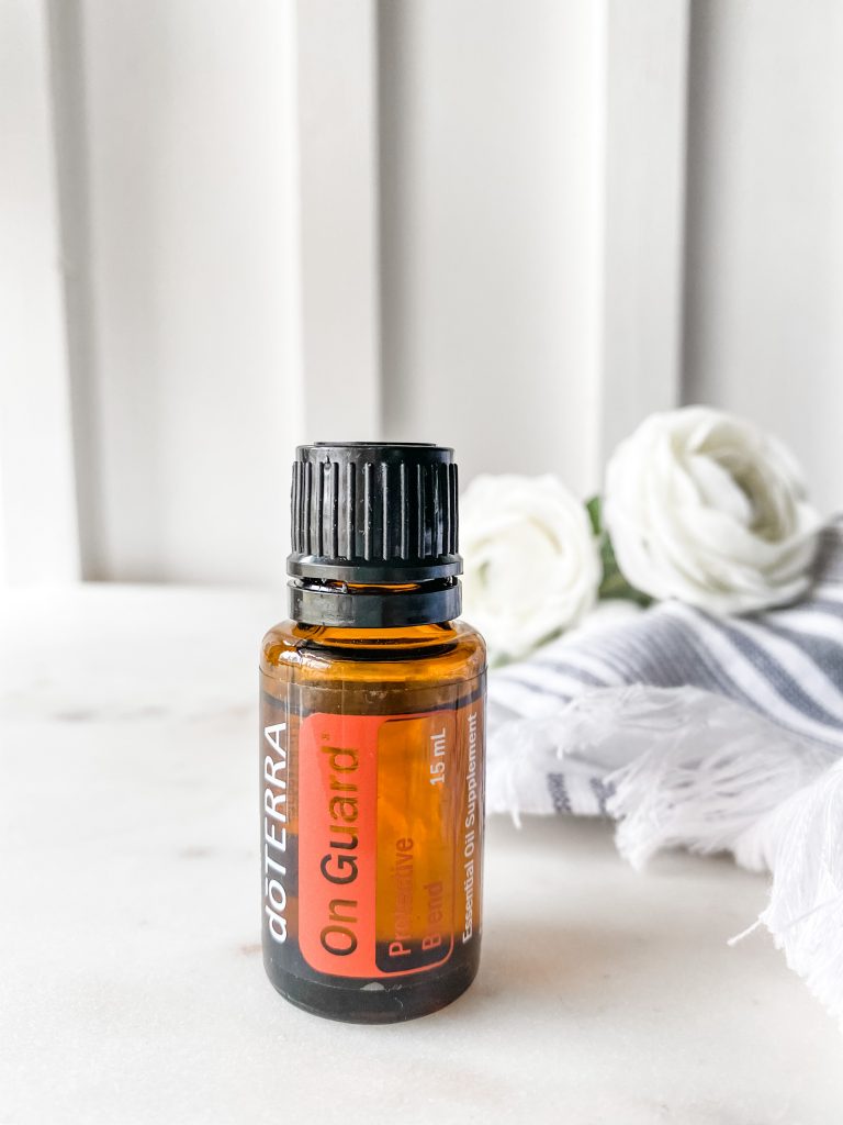DoTERRA OnGuard essential oil with flowers