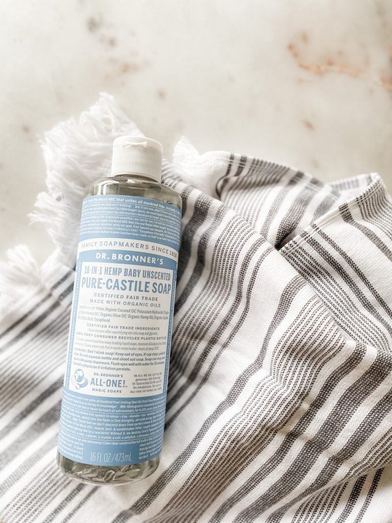 Dr. Bronners pure castile soap and striped towel
