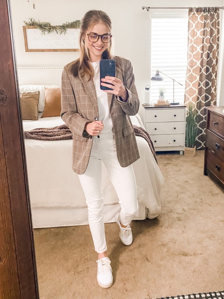 girl wearing white t-shirt paired with a blazer and pants