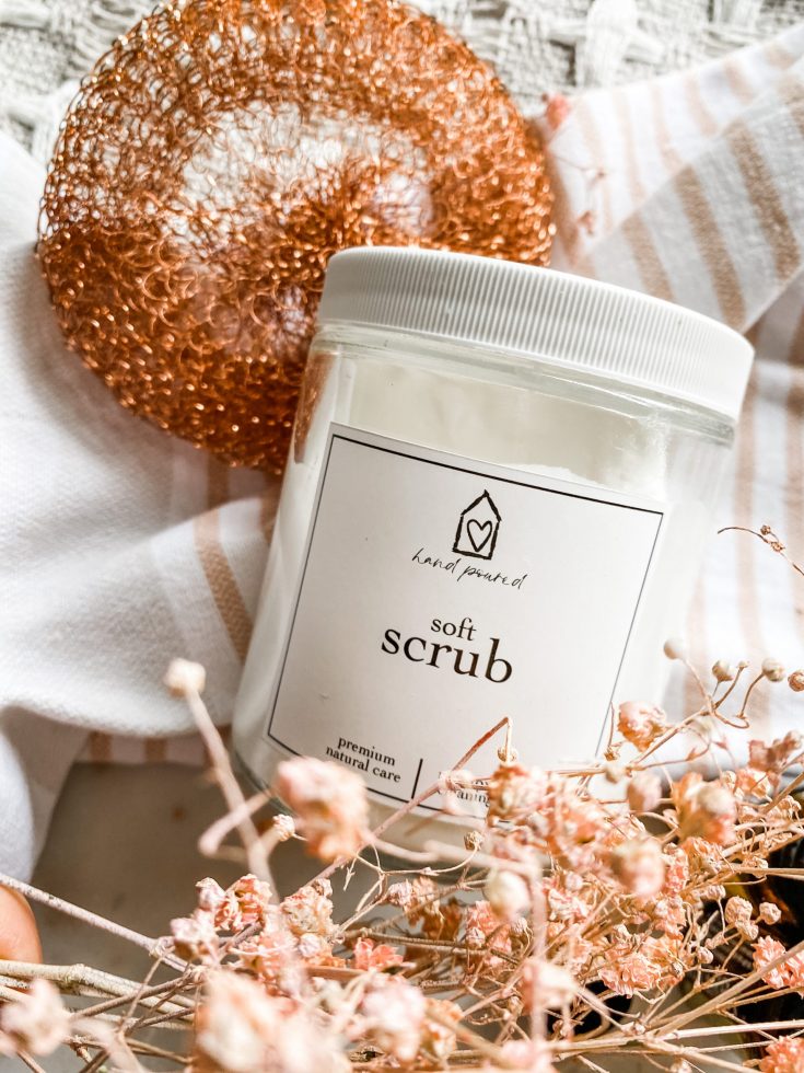 soft scrub jar with copper scrubber and rose florals