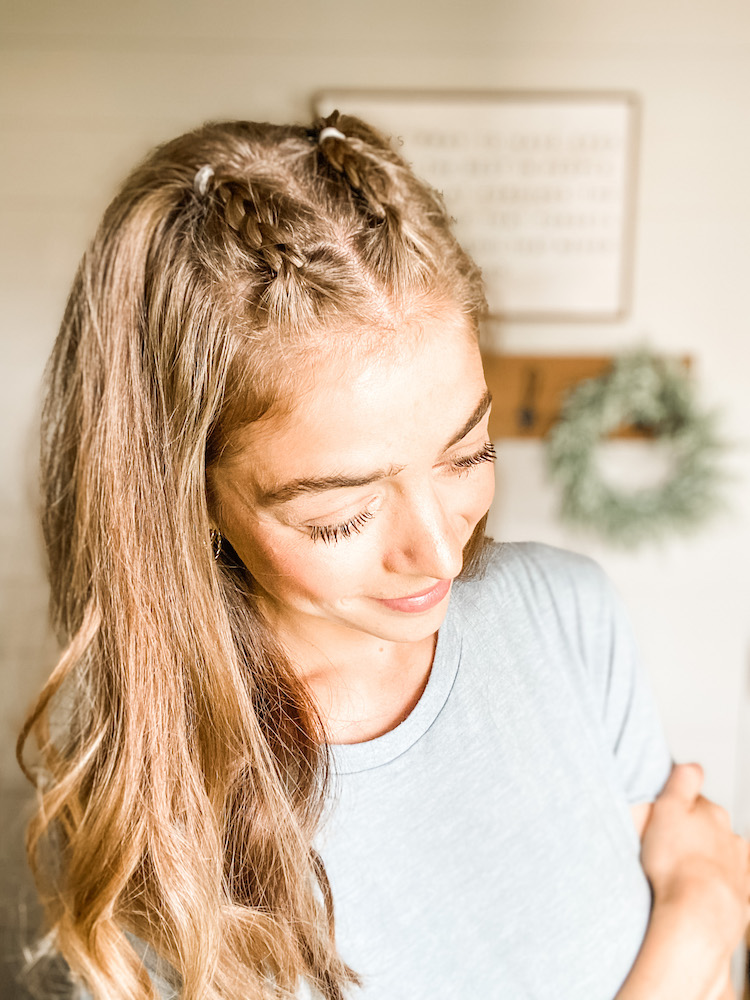 small braided pigtails on top of head faux French braids photo taken from front top