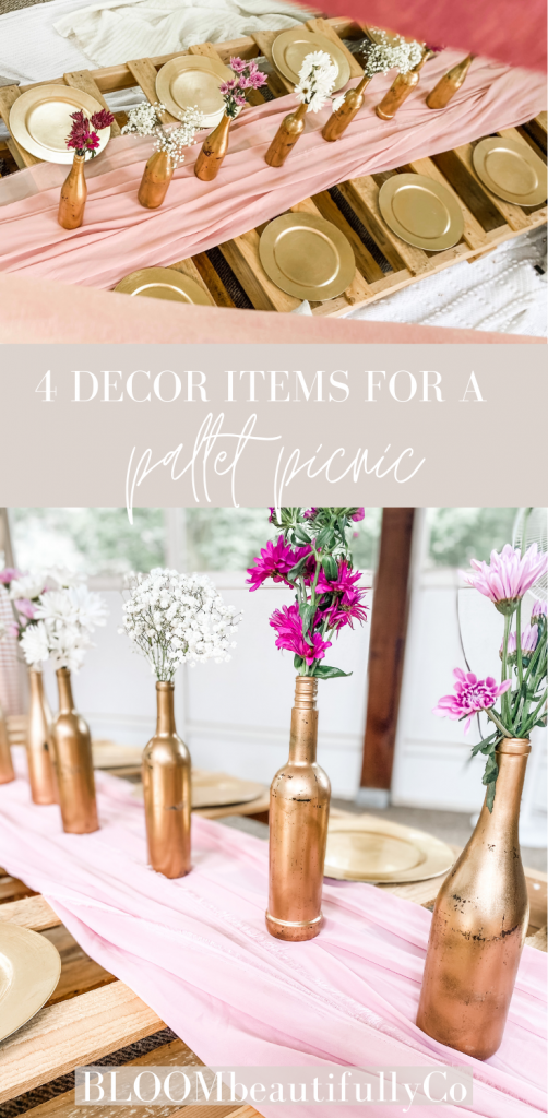 top view of a pallet table with decor items on it and another close up photo of the table, pink runner and gold wine bottles with pink florals