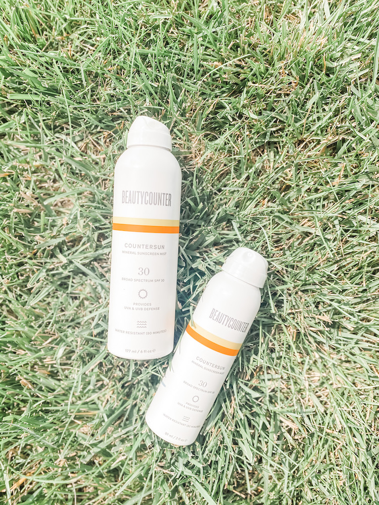A large countersun and small countersun laying in the grass